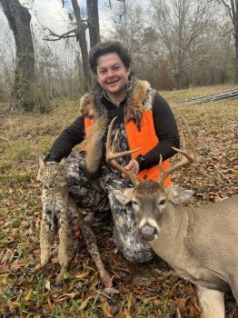 Madison Hobbs with a beautiful 10 point, a bobcat, and a red fox.